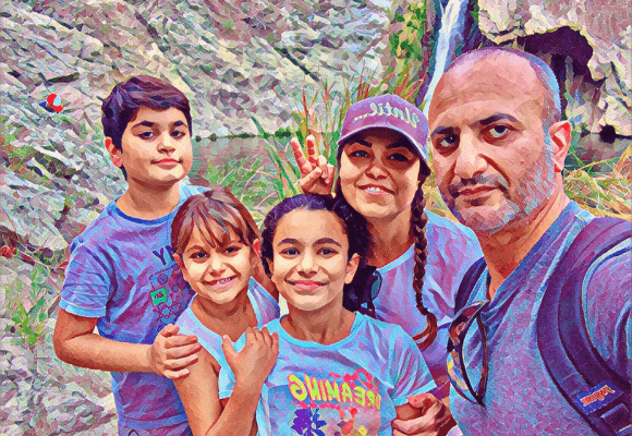 Outdoor photo of Armenian kids club family photo with waterfall background 